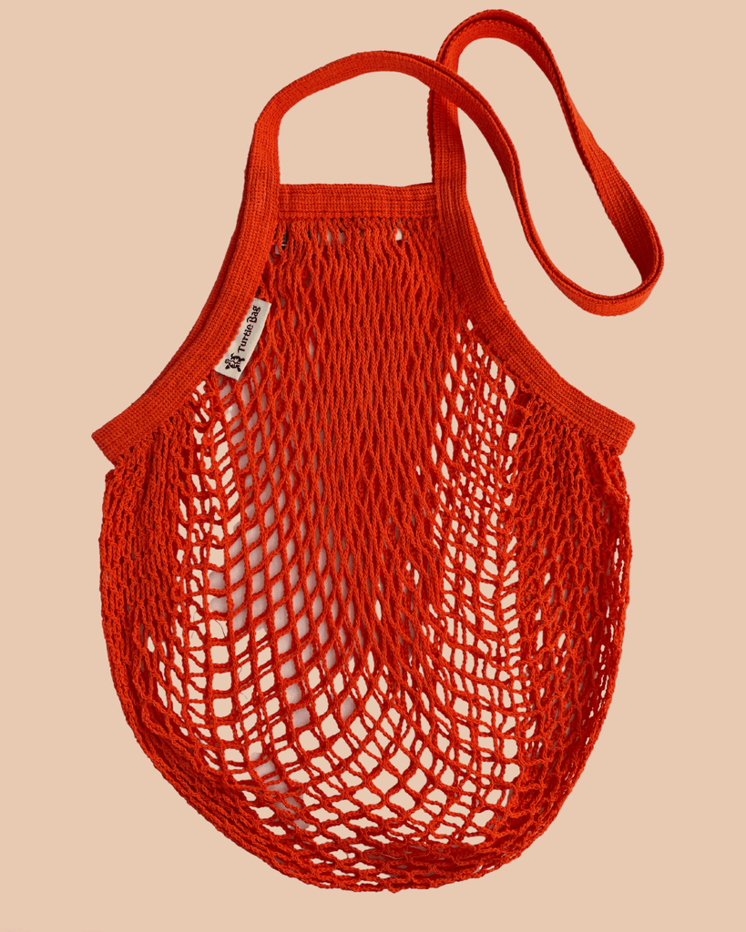 Different Kind Goods that do good ethical gifting turle bag orange.png